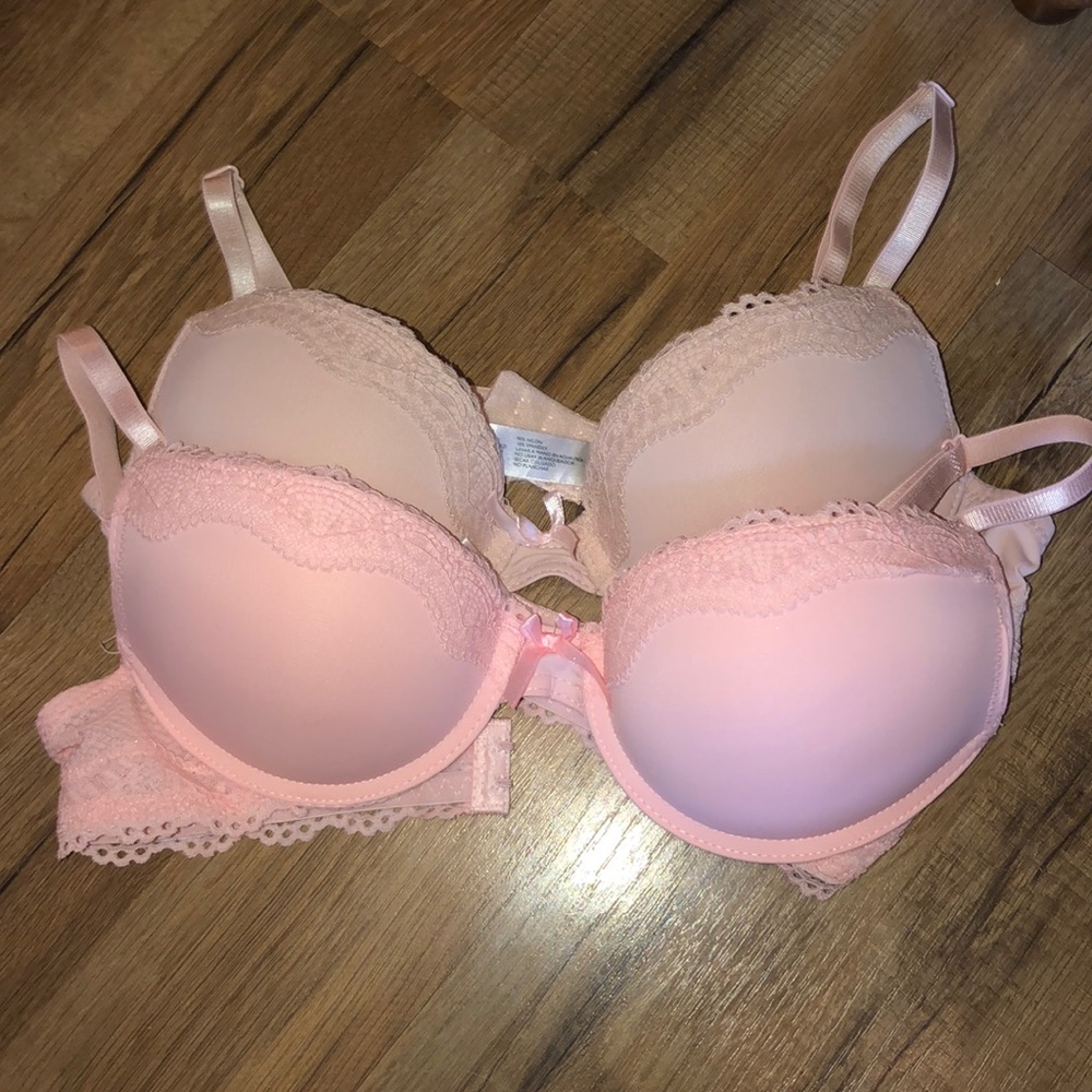 2 pink push up bras